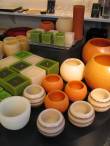 Candles in trendy colors (edamame green, pumpkin orange and white)