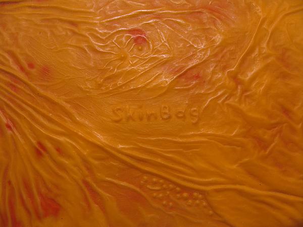 Synthetic skin with organic appearance