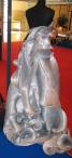 This dress has immaculate curves of silver