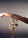 Jewelry with the 'air' of luxury in a cascade of falling leaves of brass and gold-plated silver
