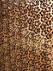 Flower shapes cut by laser, metallic nailheads as decoration. Wool fabric basics
