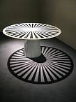 This table is made from a single sheet of metal, laser cut and folded