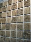 Wall panels made from broken rubber bands