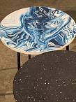 The different colored patterns are determined by how much pigment is added to the casting mix, and how the mix is poured into each individual mold. Each object is a visual �frozen moment� of the process of making.