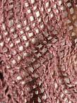 Large scale open work cotton fabric using a combination of low twist and slub yarns for beautiful texture