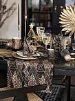Luxury Trees in black, gold and bronze are popular and bring glamour in art deco style to the festive tables