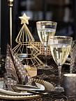Luxury Trees in black, gold and bronze are popular and bring glamour in art deco style to the festive tables